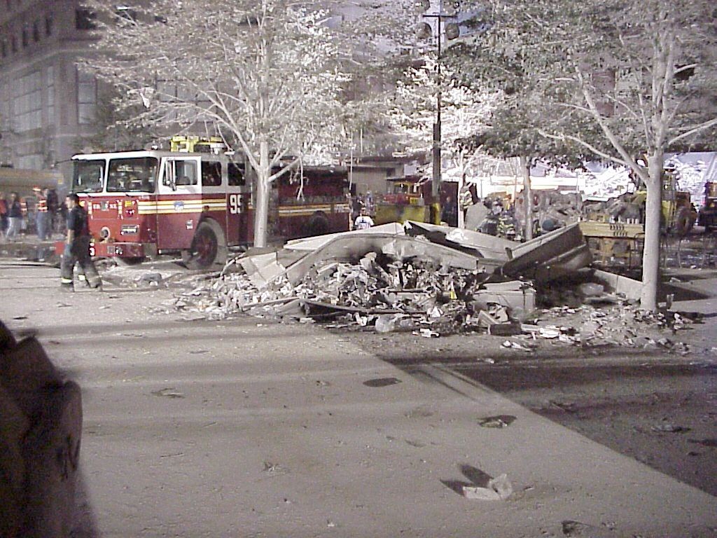 World Trade Center site, 2001: the debris field with standing facade sections and recovery equipment.